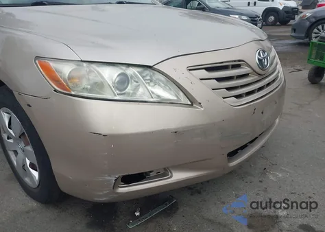 2007 Toyota Camry Le z USA, uszkodzony, nr VIN 4T1BE46K07U623319